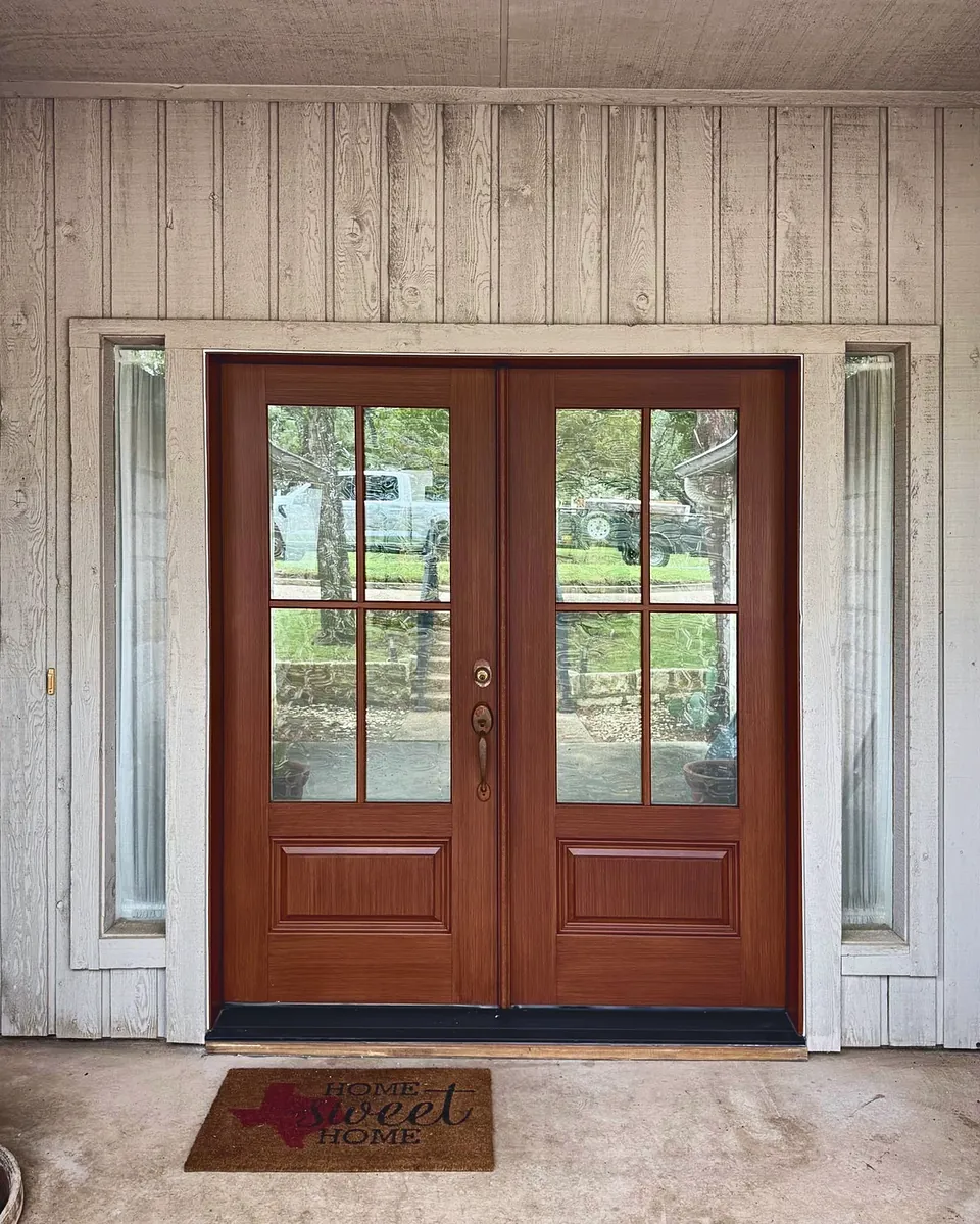 Stained wood double entry doors with sidelights